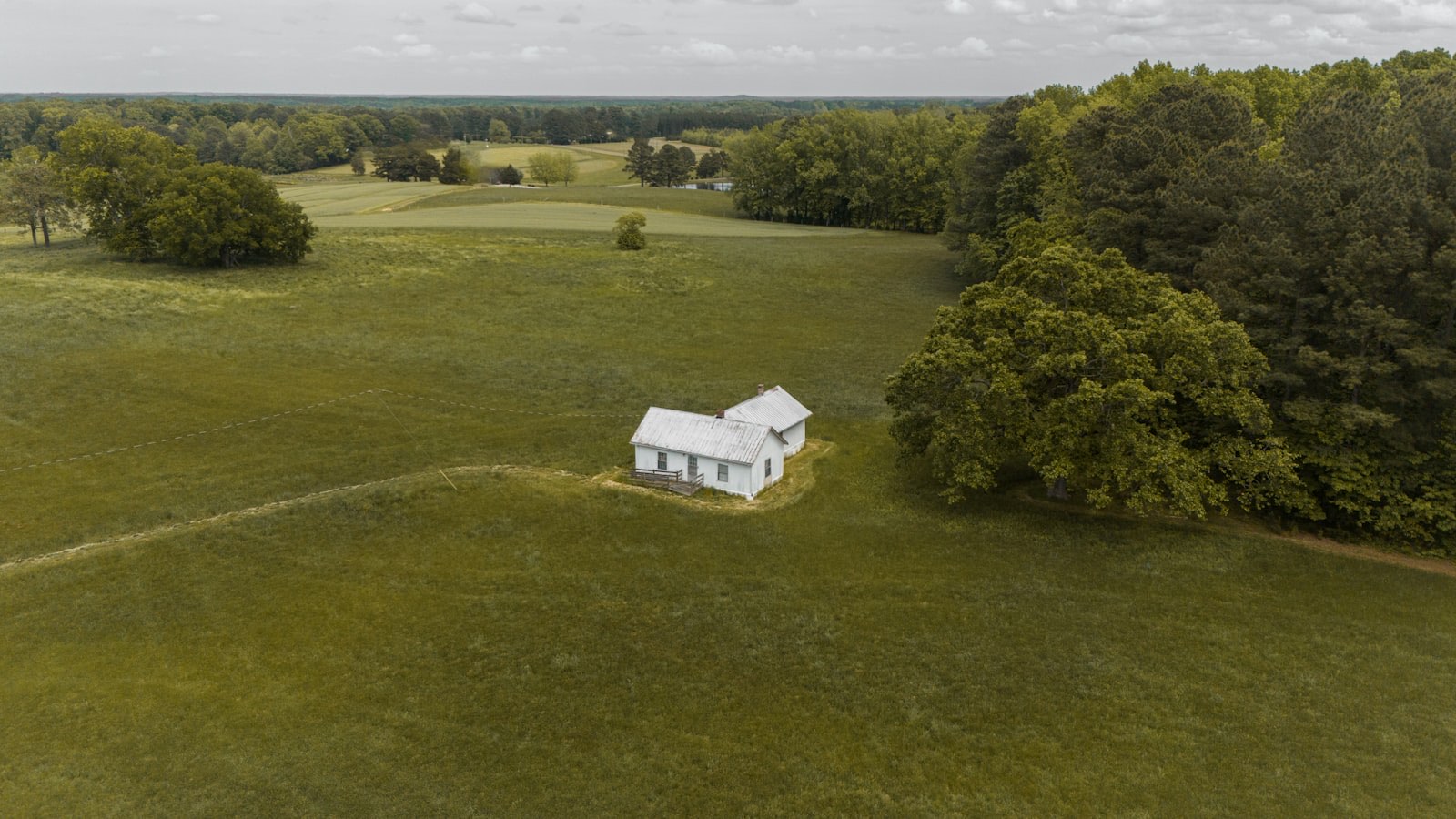 Aerial view of a house on a large rural block
